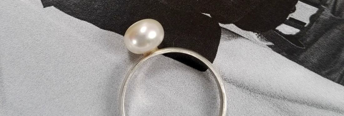 Sterling silver ring with a natural pearl